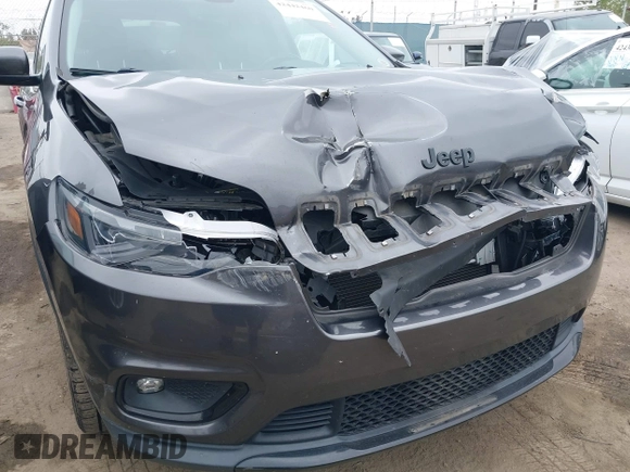 2019 Jeep Cherokee Latitude Plus z VIN 1C4PJLLN6KD326921, wystawiony jako IAAI lot #42442460 z przebiegiem 71 516 mil mil oraz . Historia ofert i sprzedaży dostępna na DreamBid. Obrazek 6.