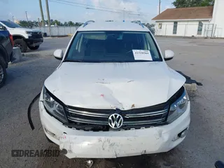 2013 Volkswagen Tiguan SE with VIN WVGAV7AX5DW545202, listed as a IAAI auction lot 42318584 with 91,556 mi miles and . Bid and sale history available at DreamBid. Image 12.