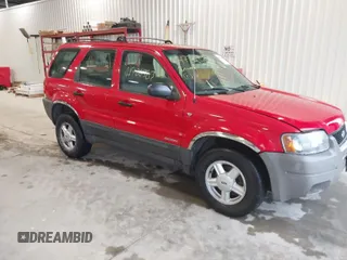 2001 Ford Escape XLS with VIN 1FMYU02191KE79727, listed as a IAAI auction lot 41720383 with 223,554 mi miles. Bid and sale history available at carsss.com. Image 1.