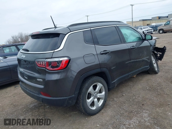 2018 Jeep Compass Latitude with VIN 3C4NJDBB8JT307154, listed as a IAAI auction lot 42056744 with 94,454 mi miles and . Bid and sale history available at DreamBid. Image 4.