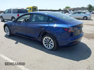 2023 Tesla Model 3 z VIN 5YJ3E1EA6PF547209, wystawiony jako IAAI lot #42511077 z przebiegiem 6 125 mil mil oraz . Historia ofert i sprzedaży dostępna na DreamBid. Obrazek 3.