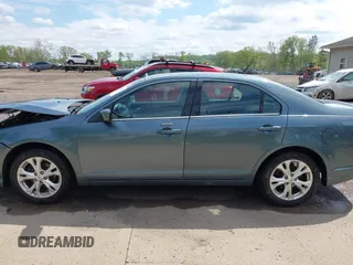 2012 Ford Fusion SE with VIN 3FAHP0HA2CR353765, listed as a IAAI auction lot 42205767 with 128,805 mi miles and . Bid and sale history available at DreamBid. Image 14.