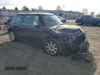 2011 MINI Hardtop S with VIN WMWSV3C55BTY13142, listed as a Copart auction lot 54543905 with Not Provided miles and Salvage Title. Bid and sale history available at DreamBid. Image 4.