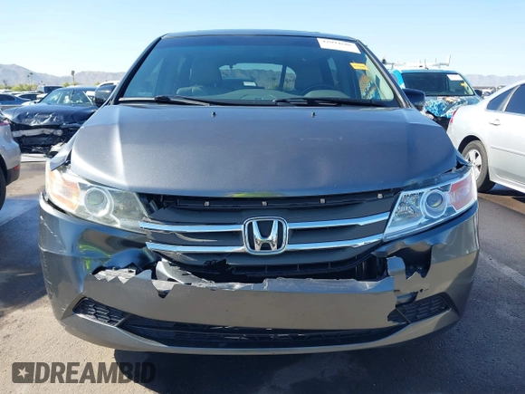 2012 Honda Odyssey EX-L with VIN 5FNRL5H64CB044075, listed as a IAAI auction lot 42094680 with 67,165 mi miles and . Bid and sale history available at carsss.com. Image 12.