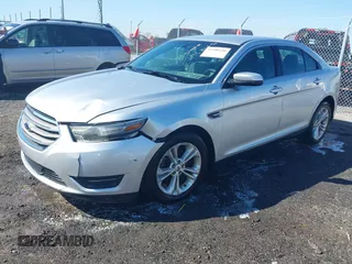 2013 Ford Taurus SEL with VIN 1FAHP2E8XDG164903, listed as a IAAI auction lot 41580690 with 163,128 mi miles and . Bid and sale history available at carsss.com. Image 17.