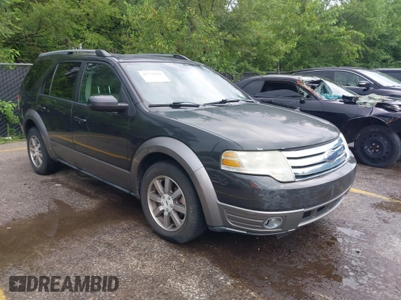2008 Ford Taurus X SEL z VIN 1FMDK02W78GA05451, wystawiony jako IAAI lot #42772241 z przebiegiem 290 453 mil mil oraz . Historia ofert i sprzedaży dostępna na DreamBid. Obrazek 1.