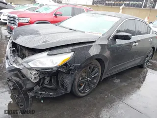 2018 Nissan Altima 2.5 SL with VIN 1N4AL3AP4JC288183, listed as a IAAI auction lot 41466582 with 100,858 mi miles. Bid and sale history available at carsss.com. Image 17.