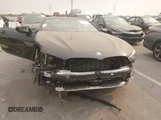 2024 BMW 8 Series M850i xDrive with VIN WBABC4C01RCR35247, listed as a IAAI auction lot 41266501 with 2,416 mi miles. Bid and sale history available at carsss.com. Image 12.