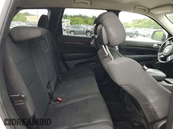 2011 Jeep Grand Cherokee Laredo with VIN 1J4RR4GG9BC515467, listed as a Copart auction lot 58411085 with 112,558 mi miles and Salvage title. Bid and sale history available at DreamBid. Image 11.