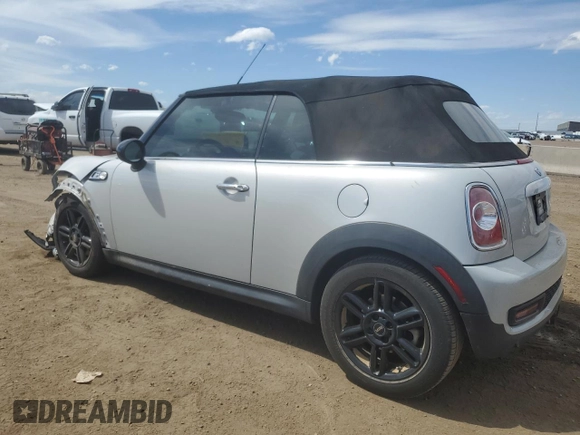2015 MINI Convertible S z VIN WMWZP3C52FT298857, wystawiony jako Copart lot #58149145 z przebiegiem 52 777 mil mil oraz Szkoda całkowita • Salvage title. Historia ofert i sprzedaży dostępna na DreamBid. Obrazek 2.