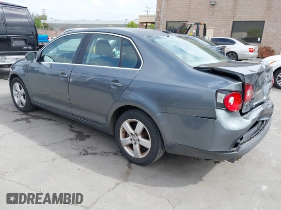 2009 Volkswagen Jetta Sedan SE with VIN 3VWRZ71K49M084983, listed as a IAAI auction lot 42095707 with 154,691 mi miles. Bid and sale history available at carsss.com. Image 3.