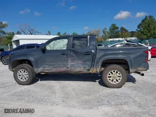 2024 Toyota Tacoma 4WD SR5 with VIN 3TYLB5JNXRT031852, listed as a IAAI auction lot 41779552 with 9,625 mi miles. Bid and sale history available at carsss.com. Image 14.