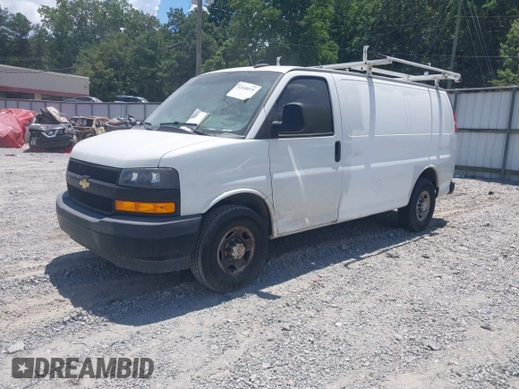 2020 Chevrolet Express Cargo with VIN 1GCWGAFG5L1119726, listed as a IAAI auction lot 42648575 with 127,516 mi miles and . Bid and sale history available at DreamBid. Image 2.