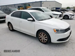 2013 Volkswagen Jetta SE z VIN 3VWDP7AJ9DM423818, wystawiony jako Copart lot #53153885 z przebiegiem 143 350 mil mil oraz Czysty tytuł • Clean title. Historia ofert i sprzedaży dostępna na DreamBid. Obrazek 4.