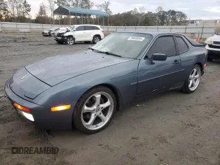 1989 Porsche 944 with VIN WP0AB2940KN451774, listed as a Copart auction lot 85991844 with 161,343 mi miles and Salvage title. Bid and sale history available at DreamBid. Image 1.