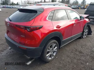 2022 Mazda CX-30 S Carbon Edition с VIN 3MVDMBCL1NM430582, выставлен на аукционе IAAI как лот 41825117 с пробегом 74 181 миль миль и . История ставок и продаж доступна на DreamBid. Изображение 4.