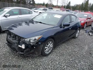 2016 Mazda Mazda3 i Grand Touring with VIN JM1BM1N73G1337274, listed as a IAAI auction lot 41851662 with 44,160 mi miles. Bid and sale history available at carsss.com. Image 2.