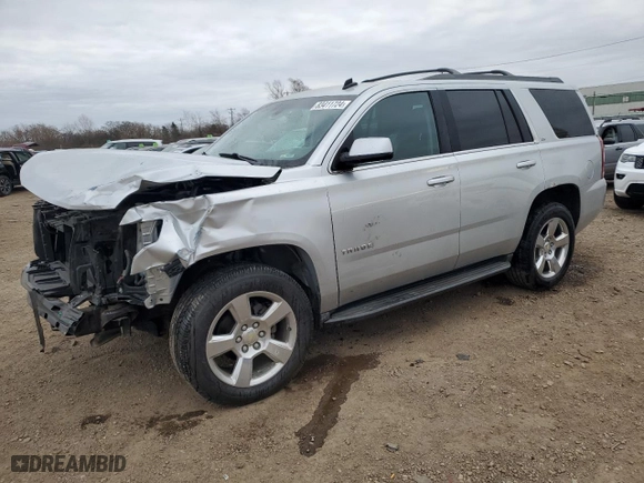 2015 Chevrolet Tahoe LS with VIN 1GNSKAKCXFR306859, listed as a Copart auction lot 83411724 with 154,517 mi miles and Salvage Title. Bid and sale history available at carsss.com. Image 1.