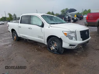 2021 Nissan Titan Pro-4X with VIN 1N6AA1ED6MN527128, listed as a IAAI auction lot 40101731 with 37,634 mi miles and . Bid and sale history available at DreamBid. Image 1.