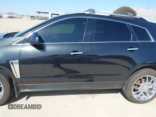 2013 Cadillac SRX Performance Collection with VIN 3GYFNHE35DS548632, listed as a IAAI auction lot 41990670 with 98,659 mi miles. Bid and sale history available at carsss.com. Image 14.