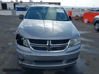 2016 Dodge Journey SE with VIN 3C4PDCAB0GT230512, listed as a IAAI auction lot 41434785 with 140,829 mi miles. Bid and sale history available at carsss.com. Image 12.