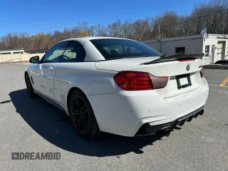 2014 BMW 4 Series 435i with VIN WBA3T3C57EP736698, listed as a Copart auction lot 52739335 with 104,403 mi miles and Clean Title. Bid and sale history available at carsss.com. Image 2.