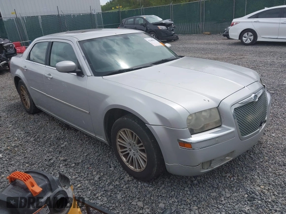 2008 Chrysler 300 Touring with VIN 2C3KA53G48H309834, listed as a IAAI auction lot 42200833 with 209,198 mi miles. Bid and sale history available at carsss.com. Image 1.