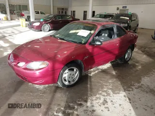 2000 Ford Escort ZX2 with VIN 3FAKP1133YR124283, listed as a IAAI auction lot 41210679 with 217,629 mi miles. Bid and sale history available at carsss.com. Image 2.