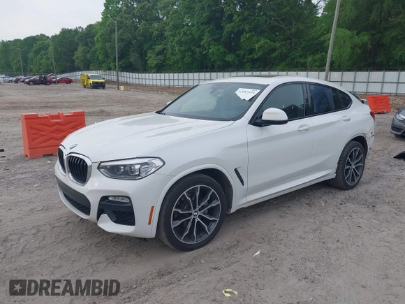 2019 BMW X4 xDrive30i with VIN 5UXUJ3C52KLG54945, listed as a IAAI auction lot 42083434 with 153,956 mi miles and . Bid and sale history available at DreamBid. Image 2.
