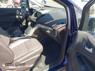 2016 Ford C-Max Energi SEL with VIN 1FADP5CU9GL102758, listed as a IAAI auction lot 41989630 with 103,410 mi miles. Bid and sale history available at carsss.com. Image 5.