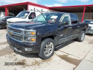 2014 Chevrolet Silverado 1500 High Country with VIN 3GCUKTEC8EG399193, listed as a IAAI auction lot 41789709 with 207,890 mi miles. Bid and sale history available at carsss.com. Image 2.