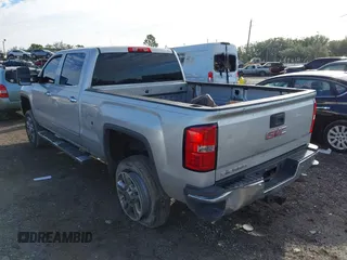 2015 GMC Sierra 2500HD available WiFi SLT with VIN 1GT12ZEG7FF167096, listed as a IAAI auction lot 41408317 with 152,969 mi miles. Bid and sale history available at carsss.com. Image 3.
