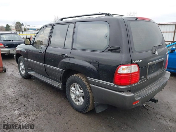 2000 Lexus LX 470 with VIN JT6HT00W0Y0111570, listed as a IAAI auction lot 41294897 with 276,909 mi miles. Bid and sale history available at carsss.com. Image 3.