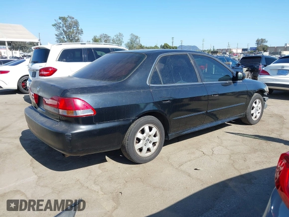 2001 Honda Accord EX z VIN JHMCG66861C018784, wystawiony jako IAAI lot #42405898 z przebiegiem 260 816 mil mil oraz . Historia ofert i sprzedaży dostępna na DreamBid. Obrazek 4.