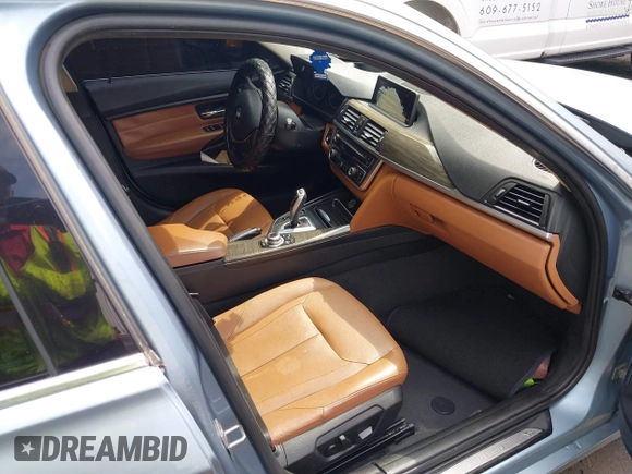 2013 BMW 3 Series 328i z VIN WBA3A5G57DNP19440, wystawiony jako IAAI lot #42540834 z przebiegiem 135 117 mil mil oraz . Historia ofert i sprzedaży dostępna na DreamBid. Obrazek 5.
