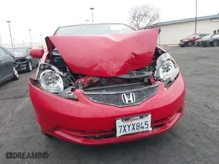 2013 Honda Fit with VIN JHMGE8H3XDC034737, listed as a IAAI auction lot 41865531 with 91,747 mi miles. Bid and sale history available at carsss.com. Image 6.