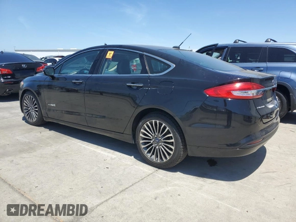 2017 Ford Fusion Hybrid SE with VIN 3FA6P0LU5HR399655, listed as a Copart auction lot 61869085 with 117,420 mi miles and Salvage title. Bid and sale history available at DreamBid. Image 2.