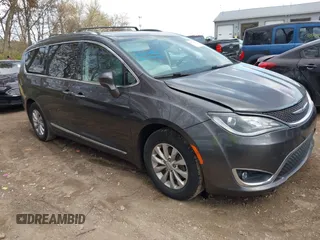 2018 Chrysler Pacifica Touring L z VIN 2C4RC1BG1JR142685, wystawiony jako IAAI lot #40779068 z przebiegiem 122 486 mil mil oraz . Historia ofert i sprzedaży dostępna na DreamBid. Obrazek 1.