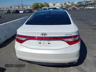 2017 Hyundai Azera Limited z VIN KMHFH4JG9HA579125, wystawiony jako IAAI lot #41718120 z przebiegiem 51 005 mil mil oraz . Historia ofert i sprzedaży dostępna na DreamBid. Obrazek 16.
