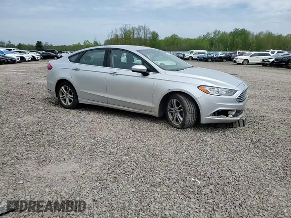 2018 Ford Fusion SE z VIN 3FA6P0H74JR112086, wystawiony jako Copart lot #56630275 z przebiegiem 123 300 mil mil oraz Szkoda całkowita • Salvage title. Historia ofert i sprzedaży dostępna na DreamBid. Obrazek 14.