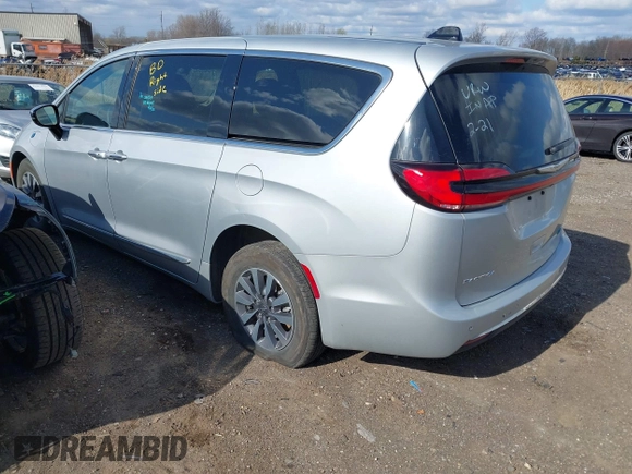 2023 Chrysler Pacifica Hybrid Limited with VIN 2C4RC1S78PR551260, listed as a IAAI auction lot 41992752 with 55,136 mi miles and . Bid and sale history available at DreamBid. Image 3.