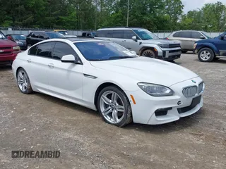 2014 BMW 6 Series 650i xDrive z VIN WBA6B4C53ED371430, wystawiony jako IAAI lot #42249544 z przebiegiem 116 425 mil mil oraz . Historia ofert i sprzedaży dostępna na DreamBid. Obrazek 1.