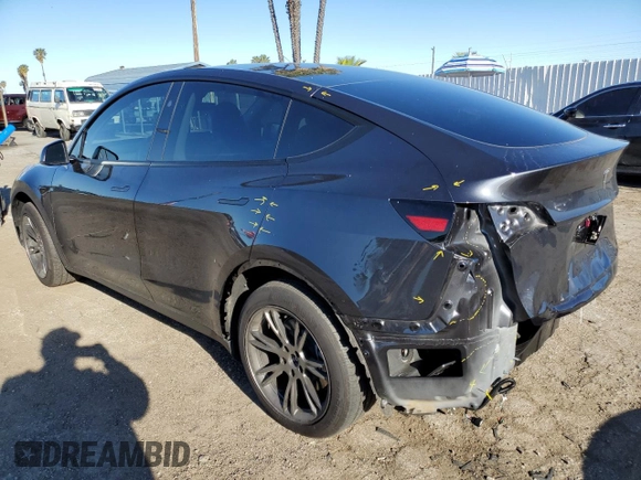2024 Tesla Model Y with VIN 7SAYGDED3RF151031, listed as a Copart auction lot 49494165 with 7,503 mi miles and Salvage Title. Bid and sale history available at DreamBid. Image 2.