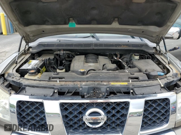 2006 Nissan Armada LE z VIN 5N1AA08B76N710950, wystawiony jako Copart lot #55981715 z przebiegiem 242 233 mil mil oraz Szkoda całkowita • Salvage title. Historia ofert i sprzedaży dostępna na DreamBid. Obrazek 12.