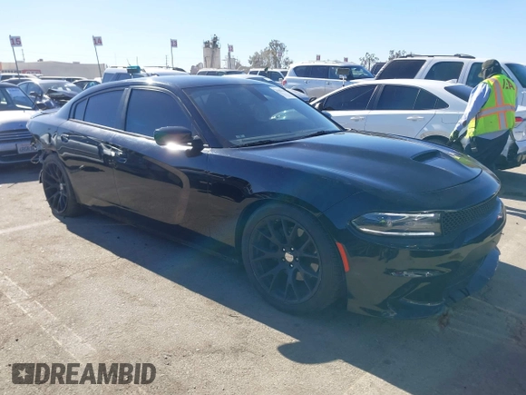 2018 Dodge Charger SXT Plus with VIN 2C3CDXHG9JH281387, listed as a IAAI auction lot 41402210 with 132,881 mi miles and . Bid and sale history available at carsss.com. Image 1.