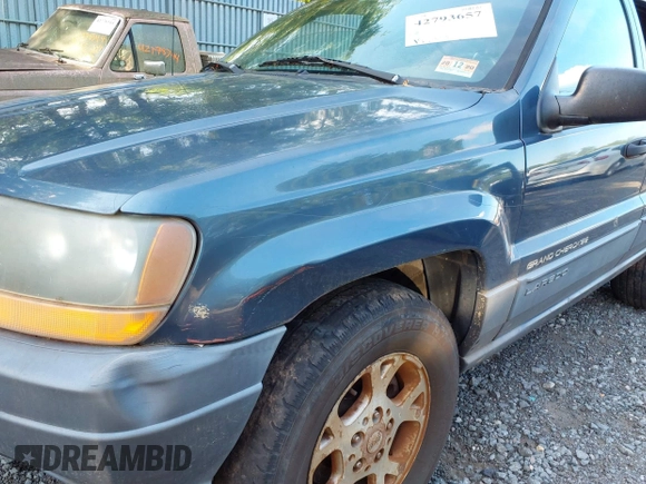 2001 Jeep Grand Cherokee Laredo with VIN 1J4GW48SX1C585867, listed as a IAAI auction lot 42793657 with 197,167 mi miles and . Bid and sale history available at DreamBid. Image 6.