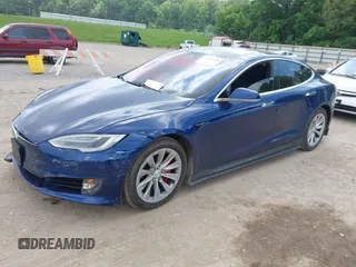 2016 Tesla Model S 90D with VIN 5YJSA1E4XGF168165, listed as a IAAI auction lot 42220139 with Not provided miles and . Bid and sale history available at DreamBid. Image 2.