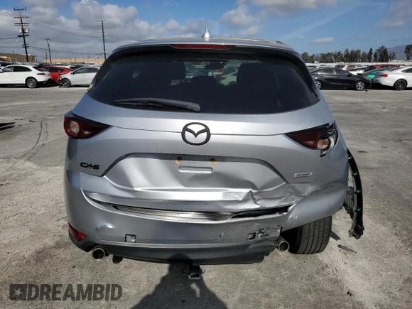 2019 Mazda CX-5 Touring with VIN JM3KFACMXK1556090, listed as a Copart auction lot 47541005 with 82,030 mi miles and Salvage Title. Bid and sale history available at carsss.com. Image 6.