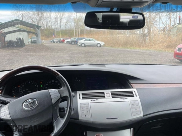 2010 Toyota Avalon XL with VIN 4T1BK3DB5AU353288, listed as a Copart auction lot 56857935 with 233,775 mi miles and Clean Title. Bid and sale history available at DreamBid. Image 9.