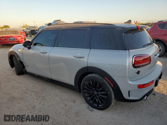 2023 MINI Clubman Cooper S with VIN WMWXJ1C0XP2T39325, listed as a Copart auction lot 77672434 with 15,932 mi miles and Salvage Title. Bid and sale history available at carsss.com. Image 2.